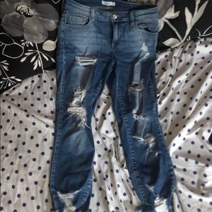 Light wash blue ripped jeans